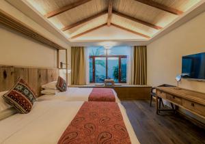 Voodi või voodid majutusasutuse The Apsara Lodge toas