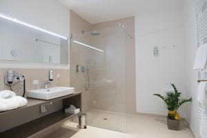 Koupelna v ubytování Vitus Steyr Hotel & SPA Suites