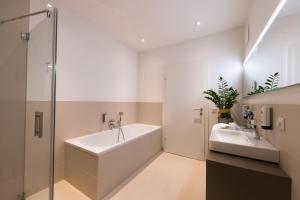 Koupelna v ubytování Vitus Steyr Hotel & SPA Suites