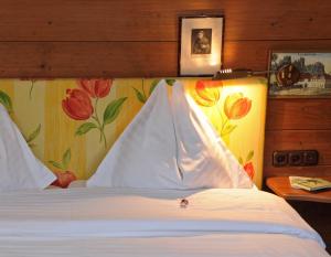 Postel nebo postele na pokoji v ubytování Hotel Schloss Leonstain