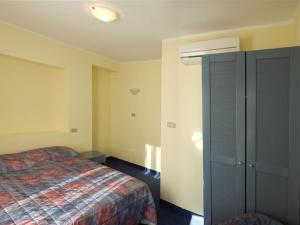 Postel nebo postele na pokoji v ubytování Garni Hotel Siesta