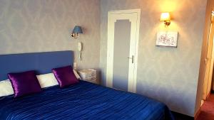 Postel nebo postele na pokoji v ubytování Hotel Restaurant La Caravelle