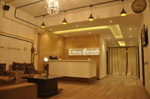 a lobby of a store with a waiting room at Lotus Grand Akm in Kālka