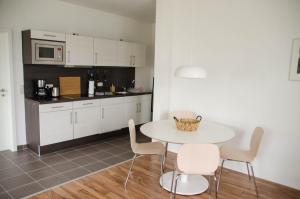 Kuchyň nebo kuchyňský kout v ubytování Ferienwohnung 1 Wildgans + 8 fotografií
