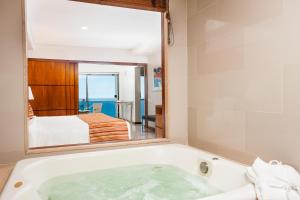 Кровать или кровати в номере Rio Othon Palace