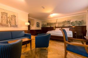 Postel nebo postele na pokoji v ubytování Hotel & Gaststätte zum Erdinger Weißbräu