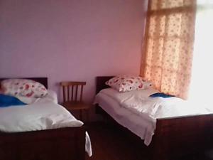 Ένα ή περισσότερα κρεβάτια σε δωμάτιο στο B&B Edem