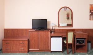 Telewizja i/lub zestaw kina domowego w obiekcie Hotel Breitenlee