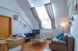 TV a/nebo společenská místnost v ubytování Modern Apartments Opatovická