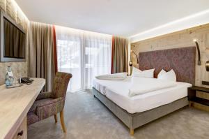 Voodi või voodid majutusasutuse Hotel Rose toas