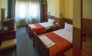 Letto o letti in una camera di Hotel Atlas