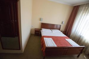 Letto o letti in una camera di Hotel Atlas