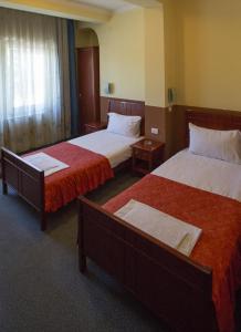 Letto o letti in una camera di Hotel Atlas