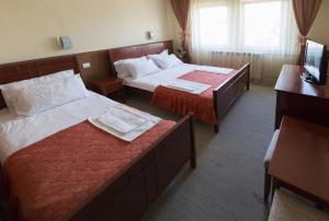 Letto o letti in una camera di Hotel Atlas