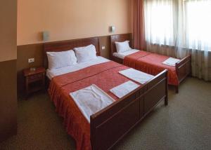 Letto o letti in una camera di Hotel Atlas
