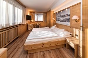 Кровать или кровати в номере Hotel Armin