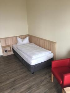 Rúm í herbergi á Rügen-Hotel