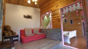 Posezení v ubytování Old Farmer Homestay