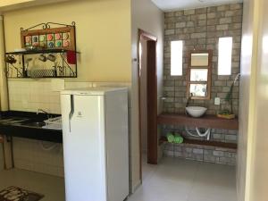 Η κουζίνα ή μικρή κουζίνα στο Pousada Beija-Flor +71 φωτογραφίες