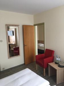 Rúm í herbergi á Rügen-Hotel