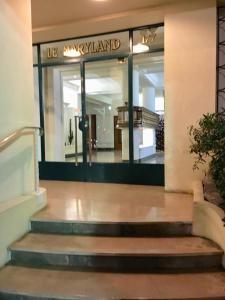 a store front with the entrance to the mall at Beachfront apartment Promenade Des Anglais in Nice