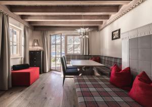 Posezení v ubytování Hotel & Chalets Edelweiss