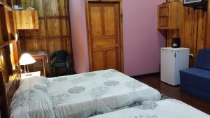 Voodi või voodid majutusasutuse Ciudad Perdida EcoLodge toas