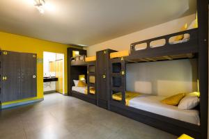 Llit o llits en una habitació de Concept Design Hostel & Suites