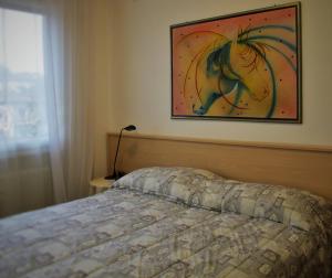 Postel nebo postele na pokoji v ubytování Bed & Breakfast Delle Rose