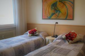 Postel nebo postele na pokoji v ubytování Bed & Breakfast Delle Rose