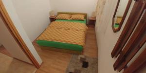 Postel nebo postele na pokoji v ubytování Apartments Dino
