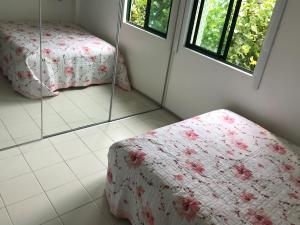 Een bed of bedden in een kamer bij Marulhos Resort Flat Particular