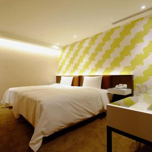 Letto o letti in una camera di Hotel Puri Taipei Station Branch