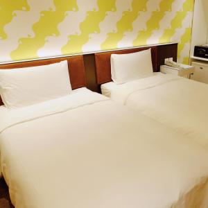 Letto o letti in una camera di Hotel Puri Taipei Station Branch