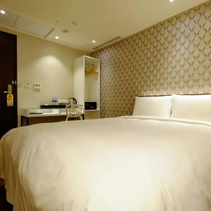 Letto o letti in una camera di Hotel Puri Taipei Station Branch