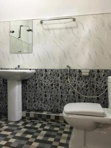 Kúpeľňa v ubytovaní Siyapath Holiday Resort