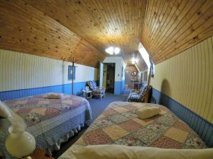 A Pilgrims Rest客房内的一张或多张床位