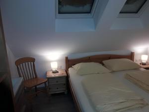 Postel nebo postele na pokoji v ubytování Ferienhaus Aloisia