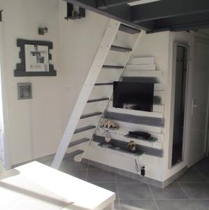 TV a/nebo společenská místnost v ubytování Maison de Vacances Bassin d'Arcachon