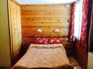 Postel nebo postele na pokoji v ubytování Hotel restaurant Le Chamois