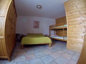 Postel nebo postele na pokoji v ubytování Hotel restaurant Le Chamois