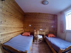 Postel nebo postele na pokoji v ubytování Hotel restaurant Le Chamois