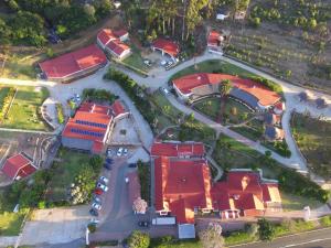 an overhead view of a house with a lot of cars at Stone Crescent Hotel in Grahamstown