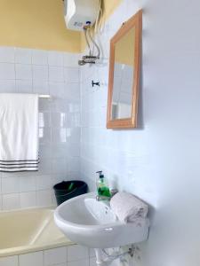 Ένα μπάνιο στο Royal German Guest House +43 φωτογραφίες