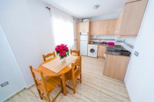 Kuchyň nebo kuchyňský kout v ubytování Homely Apartments Blasco Ibañez