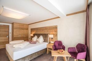 Postel nebo postele na pokoji v ubytování Gasthof Ellmauer Hof