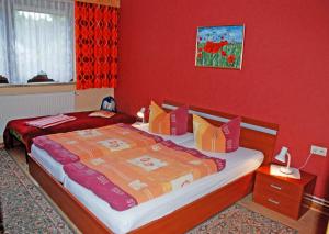 Ferienwohnungen im Ostseebad Baabeにあるベッド