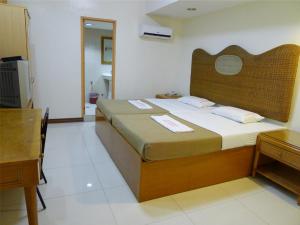 Katil atau katil-katil dalam bilik di Cebuview Tourist Inn