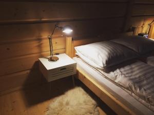 Posteľ alebo postele v izbe v ubytovaní ARKA POKOJE DE LUX