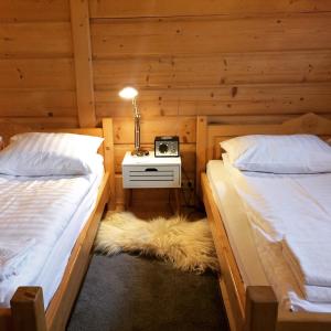 Posteľ alebo postele v izbe v ubytovaní ARKA POKOJE DE LUX